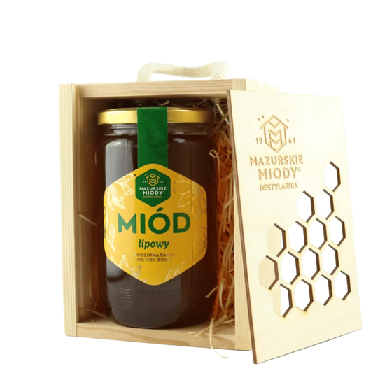 Miód lipowy w drewnianej skrzynce